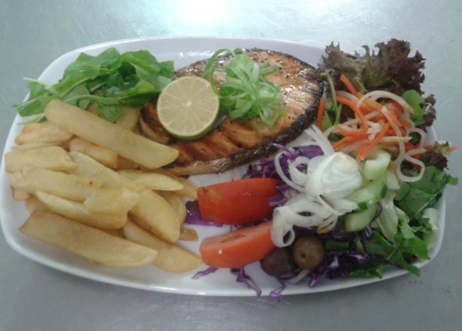 Grilled Salmon with french fries and fresh Salad malta, Our Food malta, Nigret Nightclub and Restaurant malta